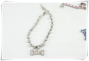 Detail of adjustable pet rhinestone collar with sparkling bone-shaped crystal pendant