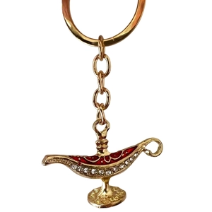 Golden Aladdin lamp keychain with red enamel patterns and sparkling white rhinestones