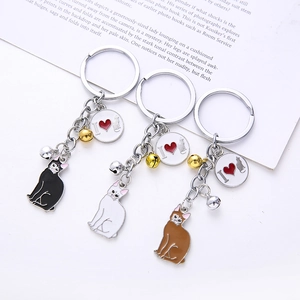 Cat theme metal keychains in black white and brown with small bells and I love cat tags