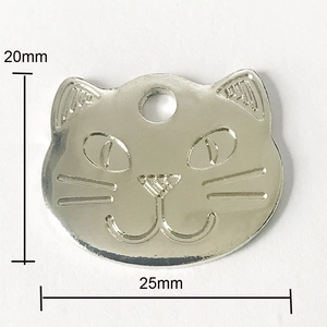 Silver metal cat-shaped pet ID tag with engraved facial details, sized 25mm by 20mm