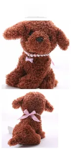 Detail view showing pet pearl collar with pink bone pendant and bow on poodle model
