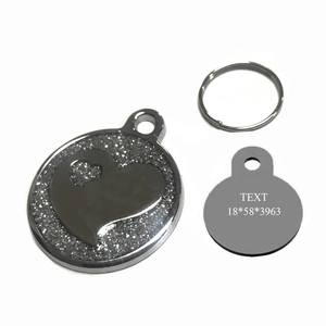 Custom heart-shaped stainless steel pet ID tag with silver glitter and engraving area