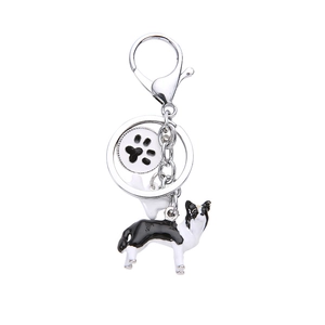 Portachiavi Border Collie 3D in metallo con impronta di zampa nera e ciondolo a osso