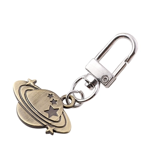 Vintage bronze Saturn planet keychain with hollow stars and durable silver metal clasp