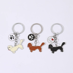 Détails de porte-clés chien en métal de trois couleurs avec pattes et charmes de cœur