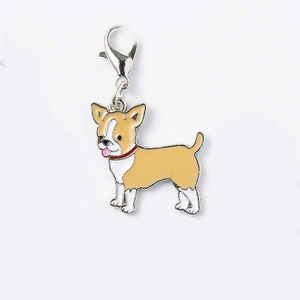 Close-up of cute enamel Chihuahua dog charm with red collar and silver lobster clasp