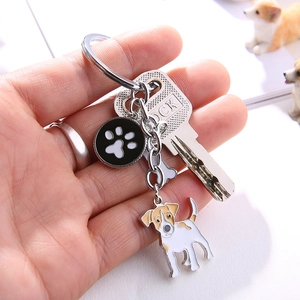 Detail of Jack Russell Terrier keychain with paw print pendant and enamel finish