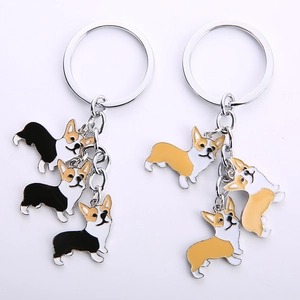 Σετ μεταλλικά μπρελόκ Corgi με πολύχρωμα σμάλτα σε καθαρό λευκό φόντο για τσάντες