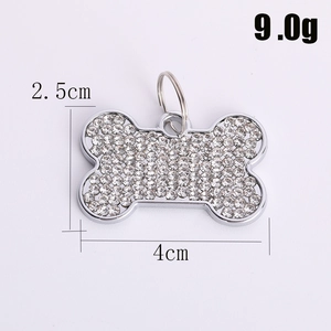 Sparkling bone-shaped pet tag with white rhinestones and silver metal frame for collars
