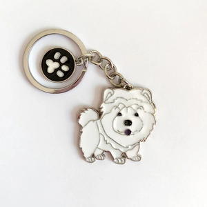 Cute white fluffy puppy enamel keychain with matching black paw print charm pendant