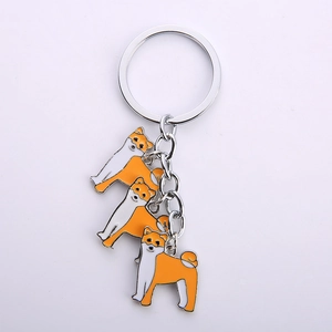 Porte-clés chien Shiba Inu créatif avec trois pendentifs en alliage orange et blanc
