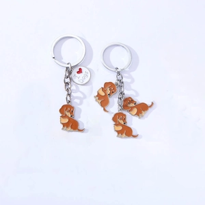 Detail of dachshund dog keychains with I Heart Dogs tag and multi-pendant enamel metal charms