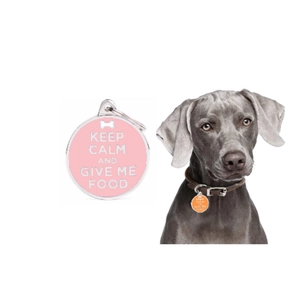 Pink metal pet tag with KEEP CALM slogan shown on a large grey dog collar