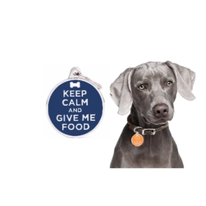 Round metal pet ID tag with Keep Calm slogan and bone icon for dogs and cats