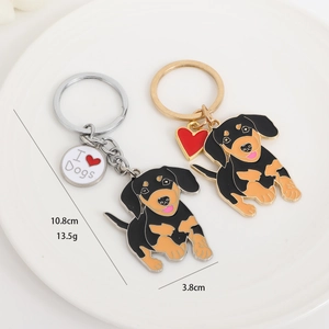 Teckel sleutelhanger set in goud en zilver met hartje en I Love Dogs gegraveerde tag