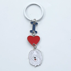 Detail of enamel I Love Dog keychain with Old English Sheepdog charm and heart icon