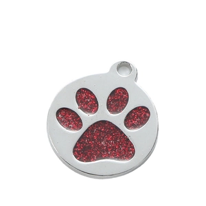 Silver metal pet ID tag with red glitter paw print design for dog collars