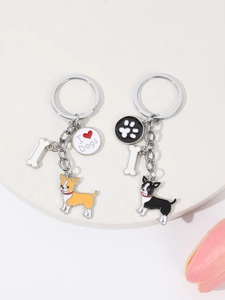 Détail de porte-clés Chihuahua et Boston Terrier avec breloques d'os et logo