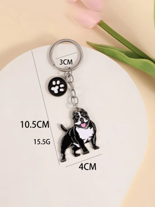 Detailed view of dog keychain dimensions including 10.5cm length and paw print charm