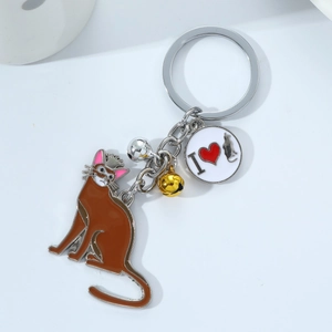 Cartoon crown cat keychain with brown enamel cat pendant, gold bell and heart paw charm