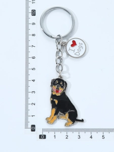 Detailed view of Rottweiler metal keychain with I Love Dogs charm and measuring ruler
