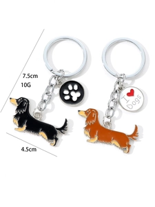 Detail view of alloy dachshund keychains with dog paw and I Love Dogs heart charms