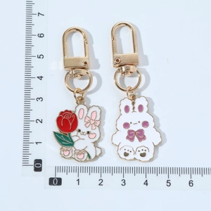 Cute cartoon bunny alloy keychains with enamel rose detail and measurement scale