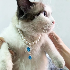 Elegant pet pearl necklace with deep blue teardrop crystal pendant for cats and small dogs