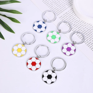 Detail showing colorful zinc alloy football keychains in six vibrant color variations