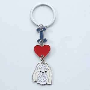 Metal keychain featuring I love my dog heart and white Maltese charm with silver ring
