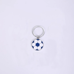 Detail of blue and white enamel soccer ball keychain with polished silver metal ring