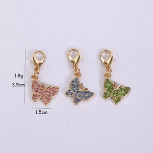 Colorful butterfly pendant set with sparkling rhinestones in pink, blue, and green colors
