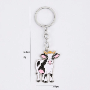 Porte-clés vache dessin animé mignon avec dimensions 10,5cm x 3,5cm et anneau argenté