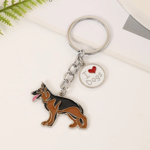 German Shepherd enamel keychain with I Love Dogs charm and silver metal ring on white surface