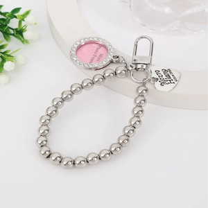Silver beaded keychain with rhinestone frame and engraved heart charm pendant