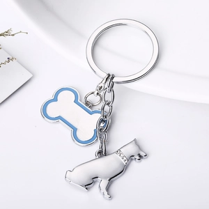 Porte-clés os de chien avec silhouette de berger allemand et strass étincelants