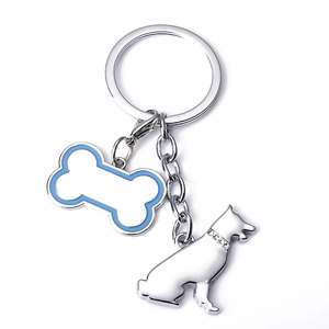Porte-clés avec pendentif Berger Allemand et os bleu orné de cristaux sur anneau argenté