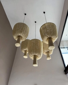 Detailed view of hand-woven cotton macrame lampshades with bohemian style fringe