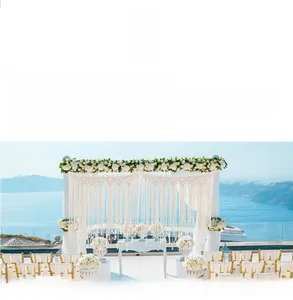 Detail of macrame wall hanging with geometric weaving and tassels for wedding decor