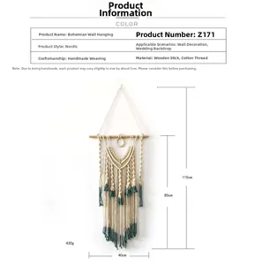 Detailed view of handmade Bohemian wall tapestry with beige and dark green cotton tassels