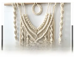 Close-up of handmade Nordic cotton rope wall hanging with complex woven texture