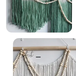 Detailed close-up of handmade macramé wall hanging with green tassels and wooden beads