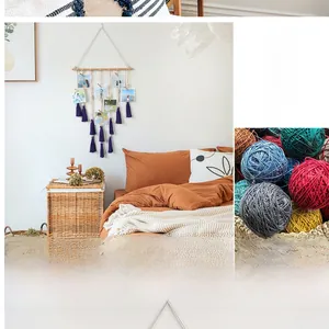 Close-up of bohemian woven tapestry with purple tassels and wooden clips for photos