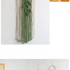 Close-up of handmade macrame wall hanging featuring green leaf patterns and cotton ropes