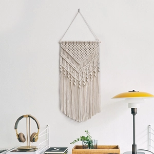 Nordic macramé wall hanging with geometric weave and long tassels for boho home decor