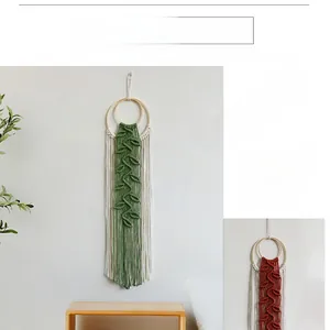 Detail of bohemian handmade woven leaf macrame wall hanging with wooden rings