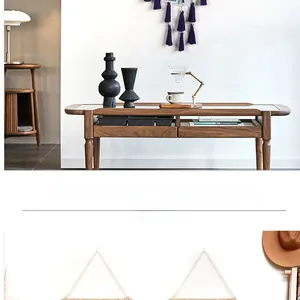 Detail of woven cotton rope wall tapestry with dark purple tassels for photo hanging decoration