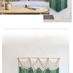 Detail of bohemian hand-woven tapestry with wood beads and dark green dip-dyed fringe