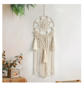 Detailed handmade bohemian woven tapestry wall hanging with fringe and circular star pattern