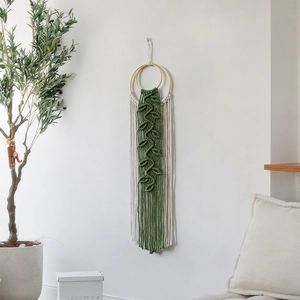 Handwoven macrame leaf wall hanging with dual rings and fringe for boho home decor